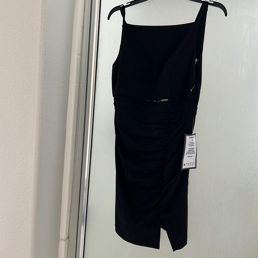 Bought for graduation photos and wore a different dress. This is new with tags